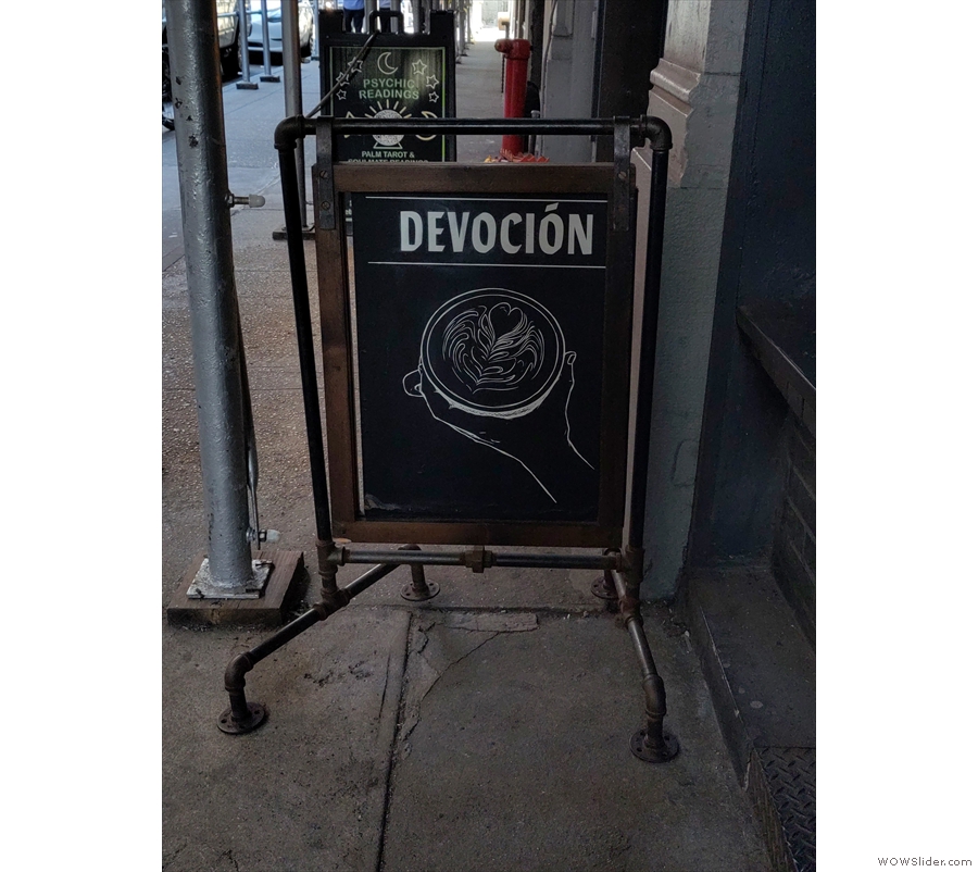 The A-board outside Devoción on W 20th Street. With the building clad in scaffolding, this is the only exterior photograph I was able to get.