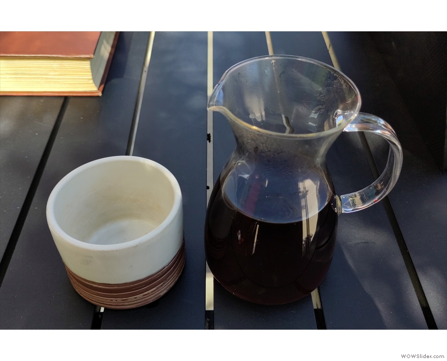 The coffee is served in the carafe, with a cup on the side. We ordered three pour-overs...