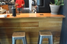 You can also sit at the end of the counter if you want. There are four stools in all.