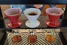The tap also moves along between the three V60s, pouring into each in turn.