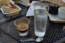I went for an espresso, which arrived in a glass, along with a glass of sparkling water.