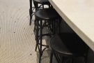 Staying at the back, this row of stools lined the back of the counter...