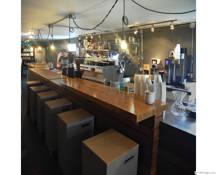 ... the row of square bar stools down the left-hand side...
