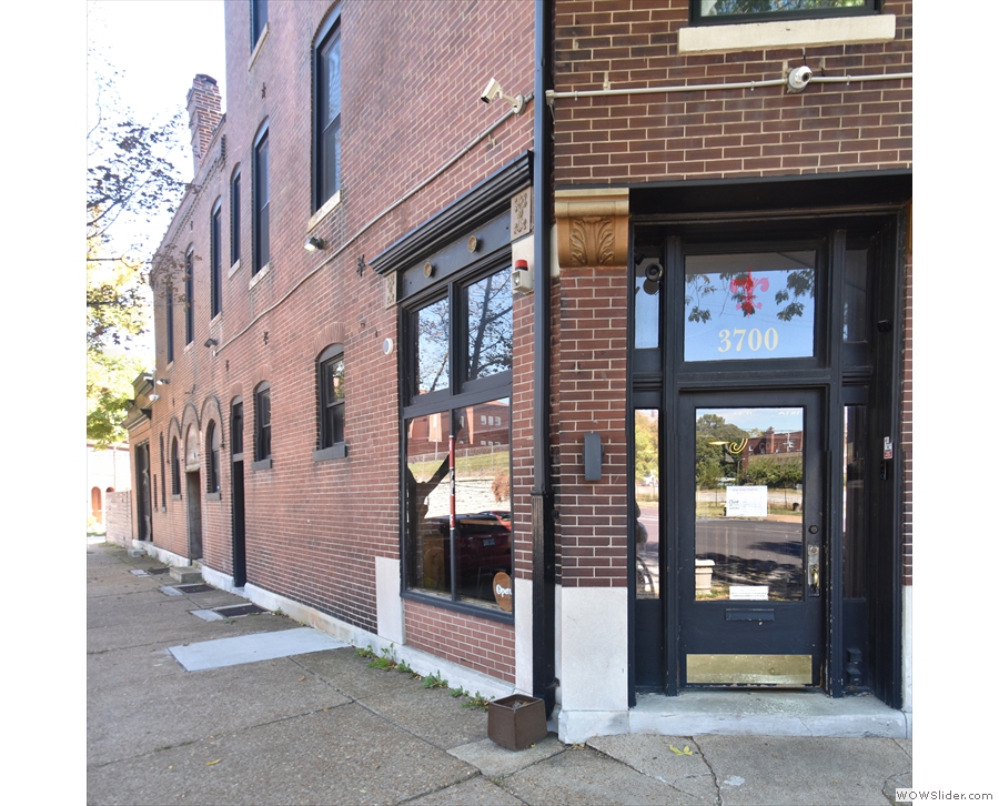 The door is on the corner, with Sump Coffee running down Winnebago Street.