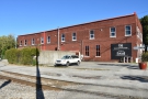 Towards the eastern end of Main Street in Chattanooga is a two-storey brick building...