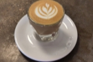 On my return the following day, I had a cortado, served in a glass with some...