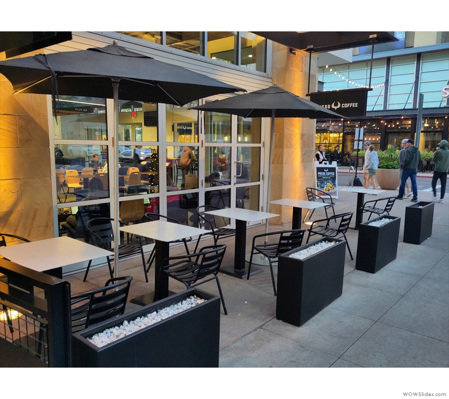 There's expanded outside seating too, with these five tables along the front...
