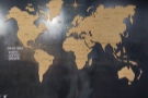The map on the wall behind the counter shows the world along with the coffee belt.