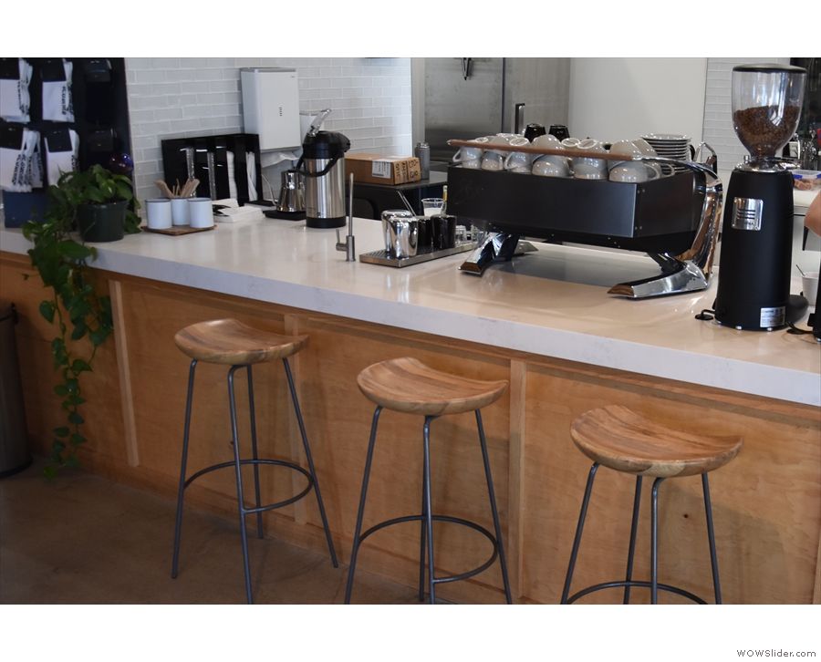 ... where you'll find three broad stools at the left hand end, by the espresso machine.