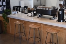 ... where you'll find three broad stools at the left hand end, by the espresso machine.
