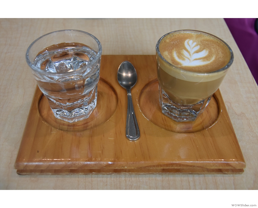 I started with a cortado, served in a glass and presented on a bespoke wooden tray...