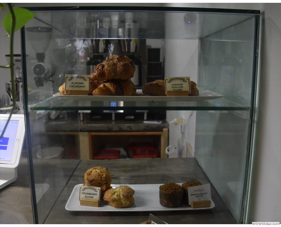 The cakes are in this glass display case on the right-hand end of the counter.