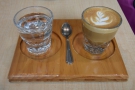 I started with a cortado, served in a glass and presented on a bespoke wooden tray...
