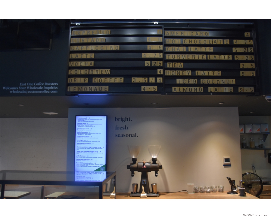 The concise menu is high up above the front of the counter...