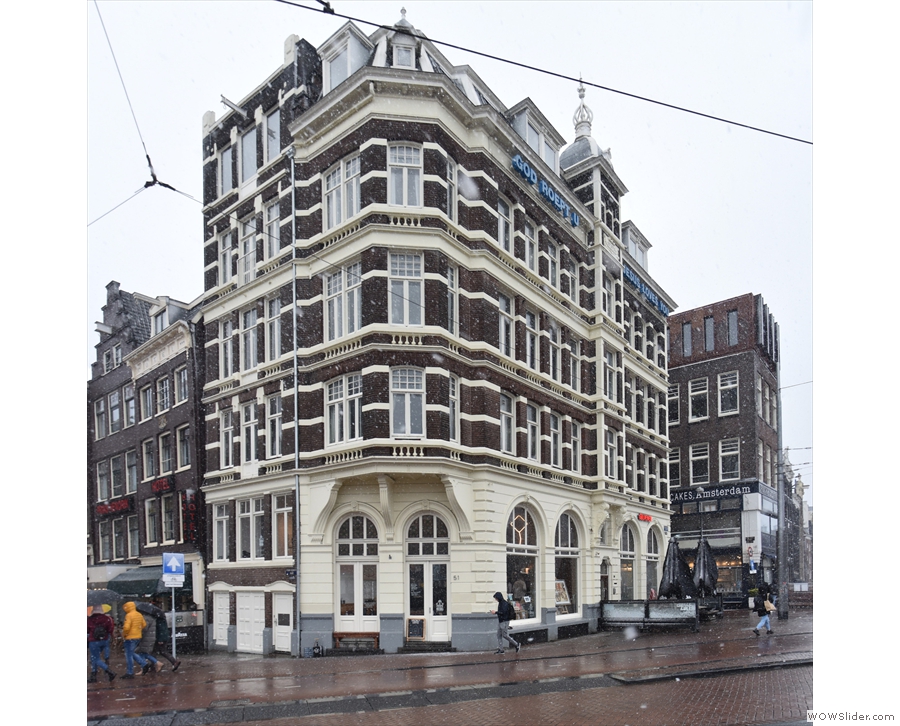 This magnificent building stands on the corner of Prins Hendrikkade, opposite the station.