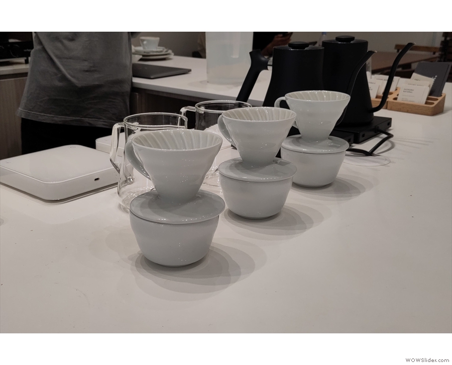 ... then comes the pour-over station and its V60s, scales and kettles.