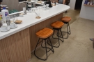 There's also seating down the side of the counter, where you'll find these three stools.