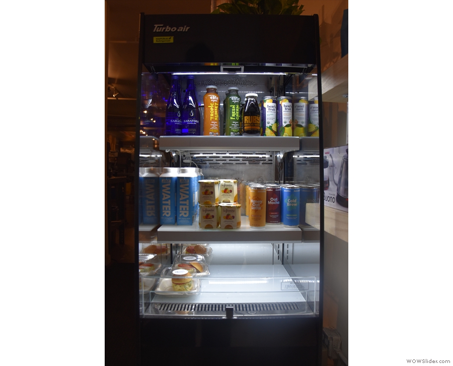 The fridge has pre-prepared sandwiches and a range of cold drinks.