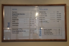 You'll find the menus here on the wall behind the counter. There are hot drinks...