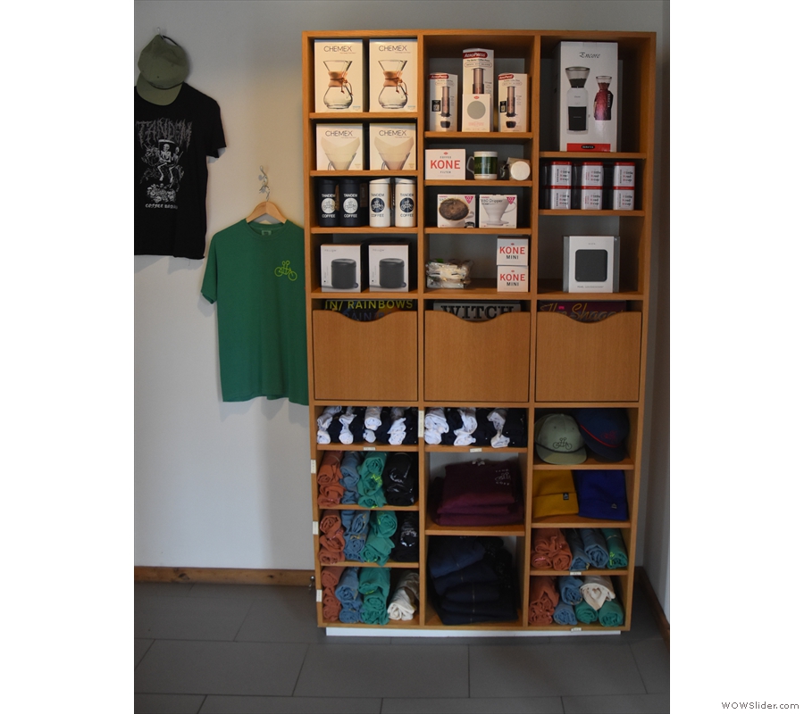 The corner between the two rooms has always had retail shelves. These days it's the...