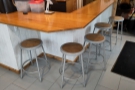 Finally, you can also sit on one of five stools at the far end of the counter.