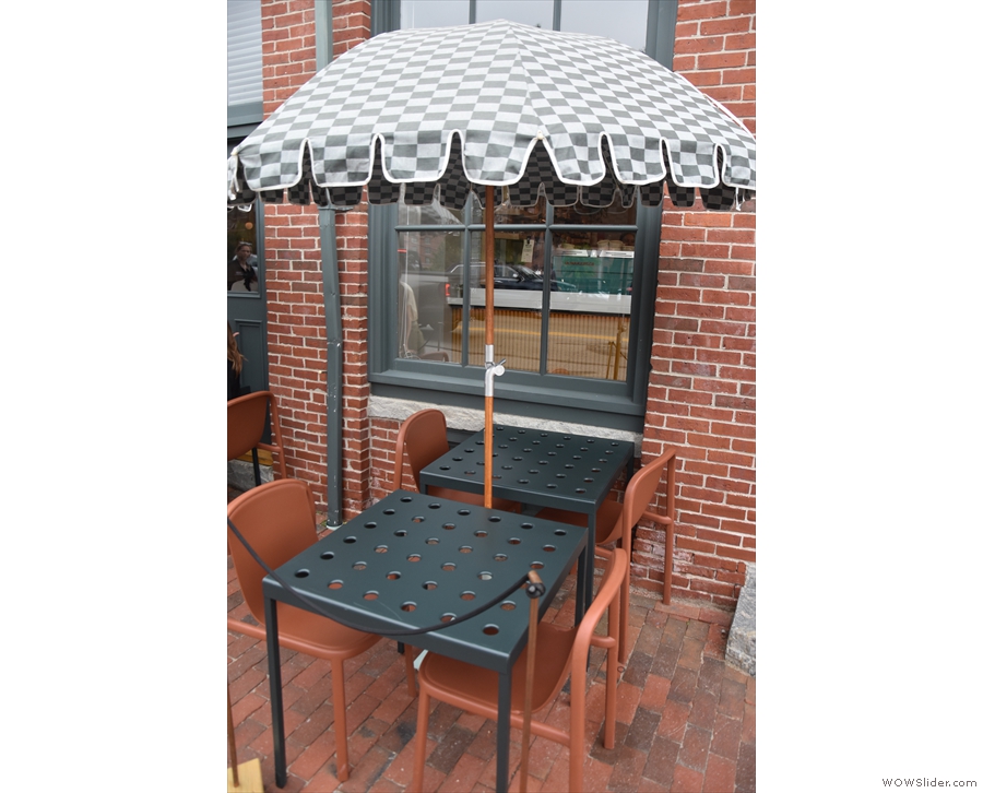 This remaining outdoor seating is formed of pairs of two-person tables like these.