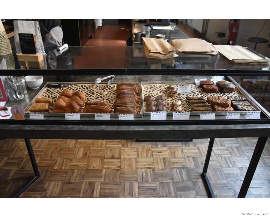 You'll find the cakes, pastries and savouries on display at the front of the counter.