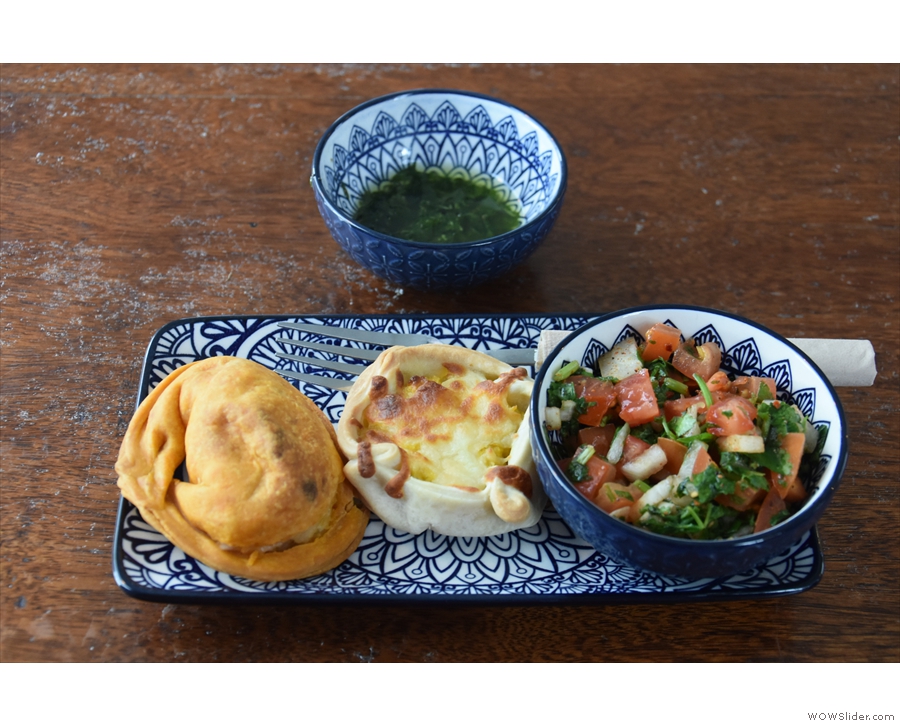 Naturally, I had to try the empanadas, served hot with a side of spicy salsa (right)...