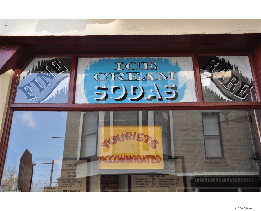 Some of the vintage signs in the windows.