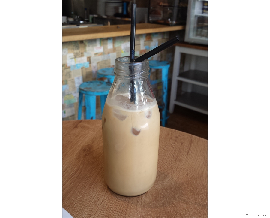 Kate's iced latte came in the cutest milk bottle...