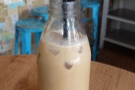 Kate's iced latte came in the cutest milk bottle...