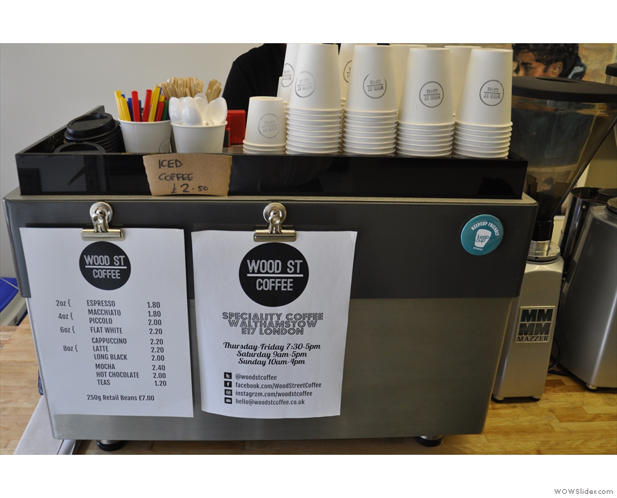 The menu is helpfully pinned up on the two-group La Marzocco.