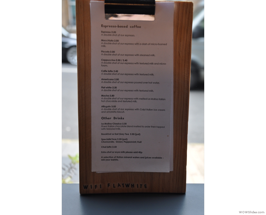 A more expansive version of the drinks menu is in the window.