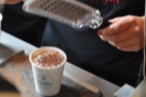 If you want chocolate on top, fresh chocolate is grated onto your drink there & then!