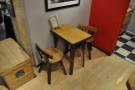There are also lots of other seating options, such as this little table in the corner...