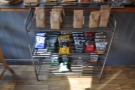 A rack holding that most natural of combinations, crisps and coffee beans.