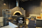 And what's that I see behind the counter? It's a pizza oven!