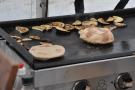 Lovely puffed-up pita-breads and aubergine, warming on the griddle!
