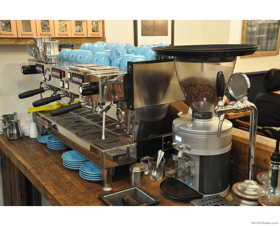 The La Marzocco espresso machine and grinder in close-up.