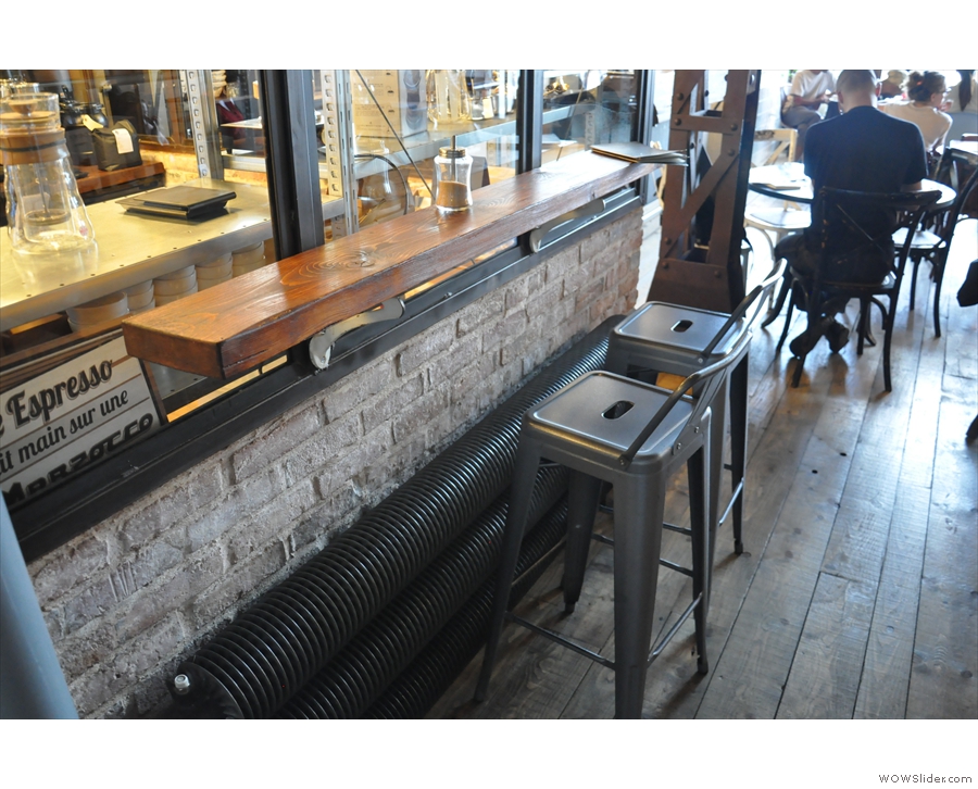 Opposite is the last of the seating, this narrow, two-person bar.