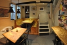 A panoramic view of the first part of the basement as we head back upstairs.