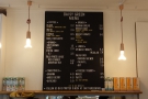 The menu, by the way, hangs above espresso machine on the back wall.