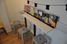 ... plus this three-person bar against the back wall.