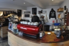 Going inside, the counter is immediately to your right, the bright red La Marzocco to the fore.