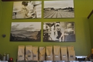 The walls, meanwhile, are hung with pictures, some of the roastery...