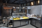 ... wihich separates the coffee shop part from the kitchen where all the food's prepared.