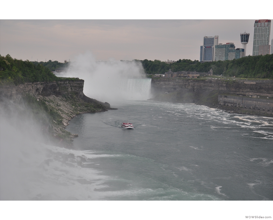 The Canadian falls are further back (the border runs down the centre of the river).