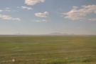I got very excited when I saw these in the distance, far away to the south. The Rockies?