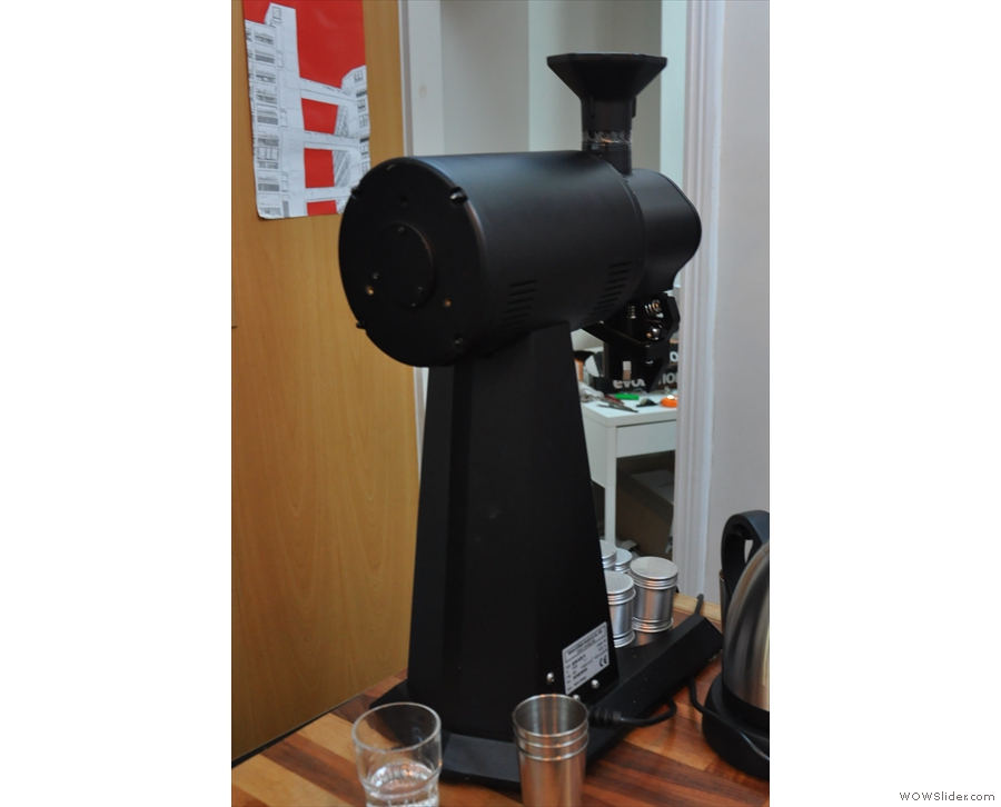 Foundry also supplies grinders, like this EK-43, with a bespoke mod, an Aeropress funnel.