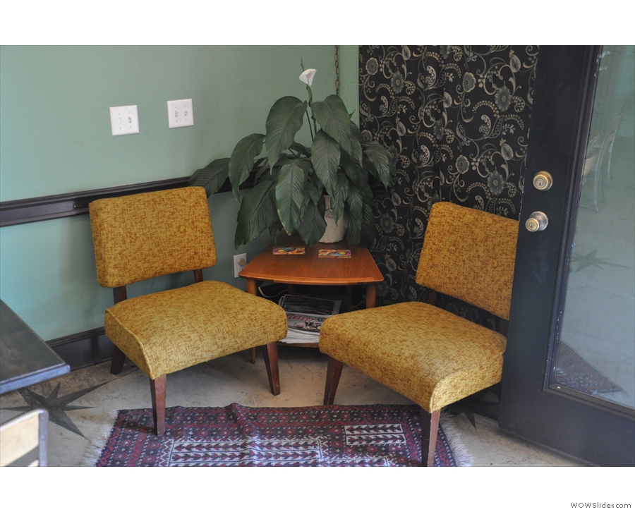There's a variety of seating, including this pair of armchairs to the right of the door.